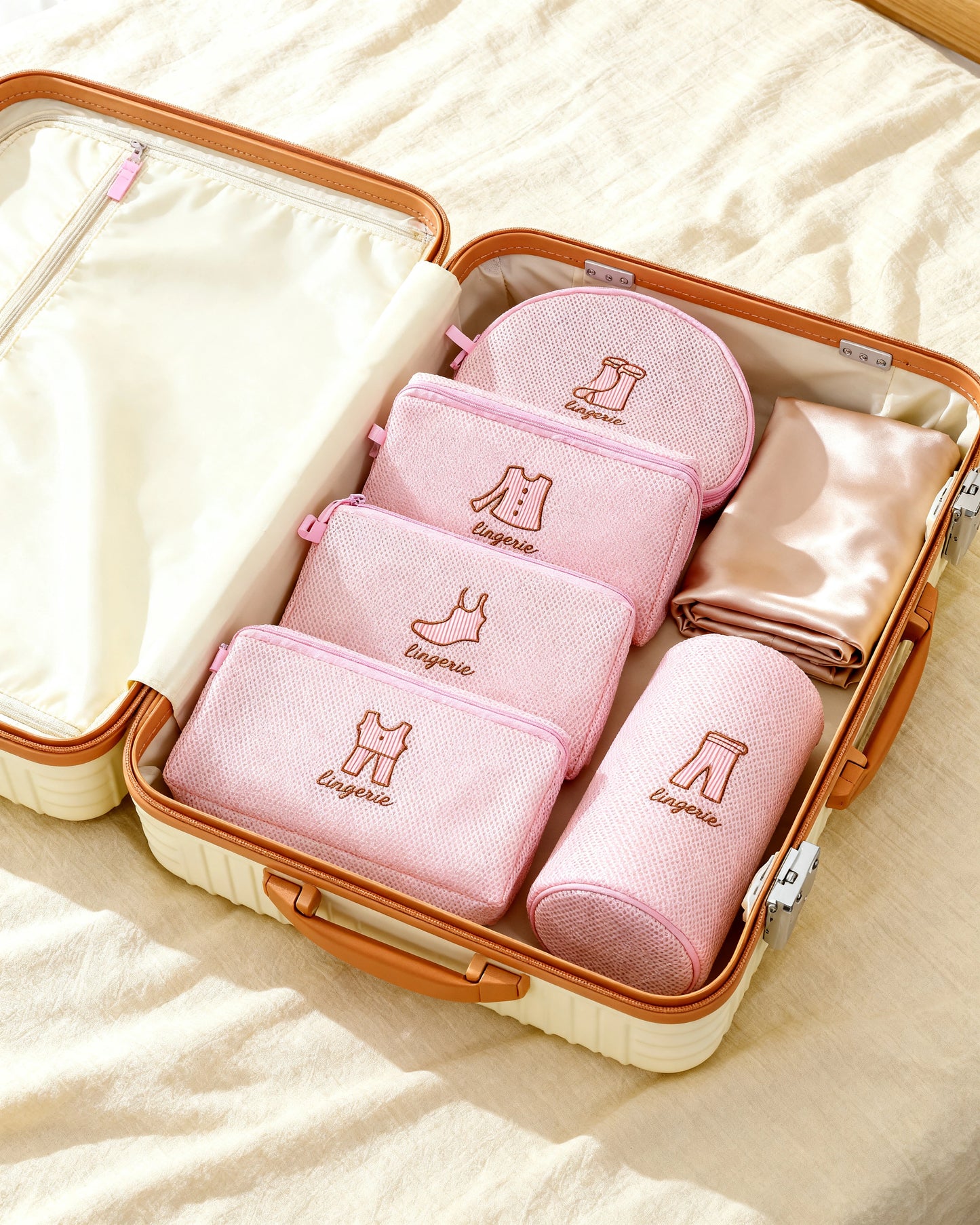 Lingerie wash bags packed inside an open travel suitcase